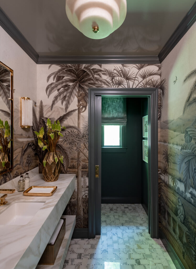 Hudson House enlarged the powder bath and covered its walls in Iksel wallpaper, giving the room a new sense of character. (Photo by Michael Hunter)