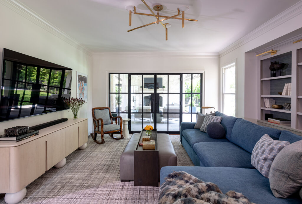 A spacious sectional and doors to the patio make this family room a place for the whole household to spend time together. (Photo by Michael Hunter)