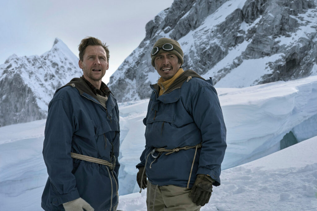 Tom Hiddleston and Genden Phuntsok in "Tenzing," premiering in theaters October 9, 2026 and on Apple TV October 16, 2026.