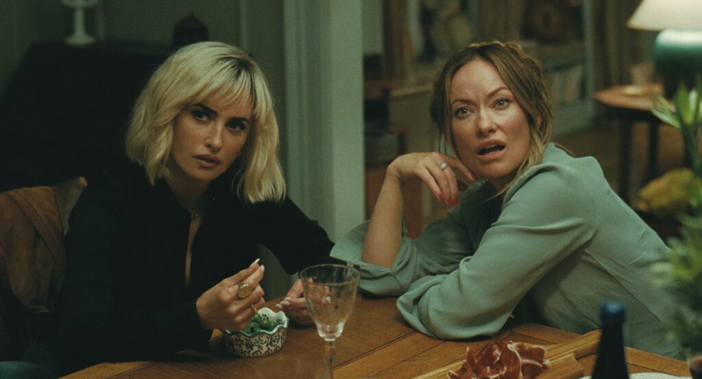 Penélope Cruz and Olivia Wilde in “The Invite.” (Courtesy of A24)