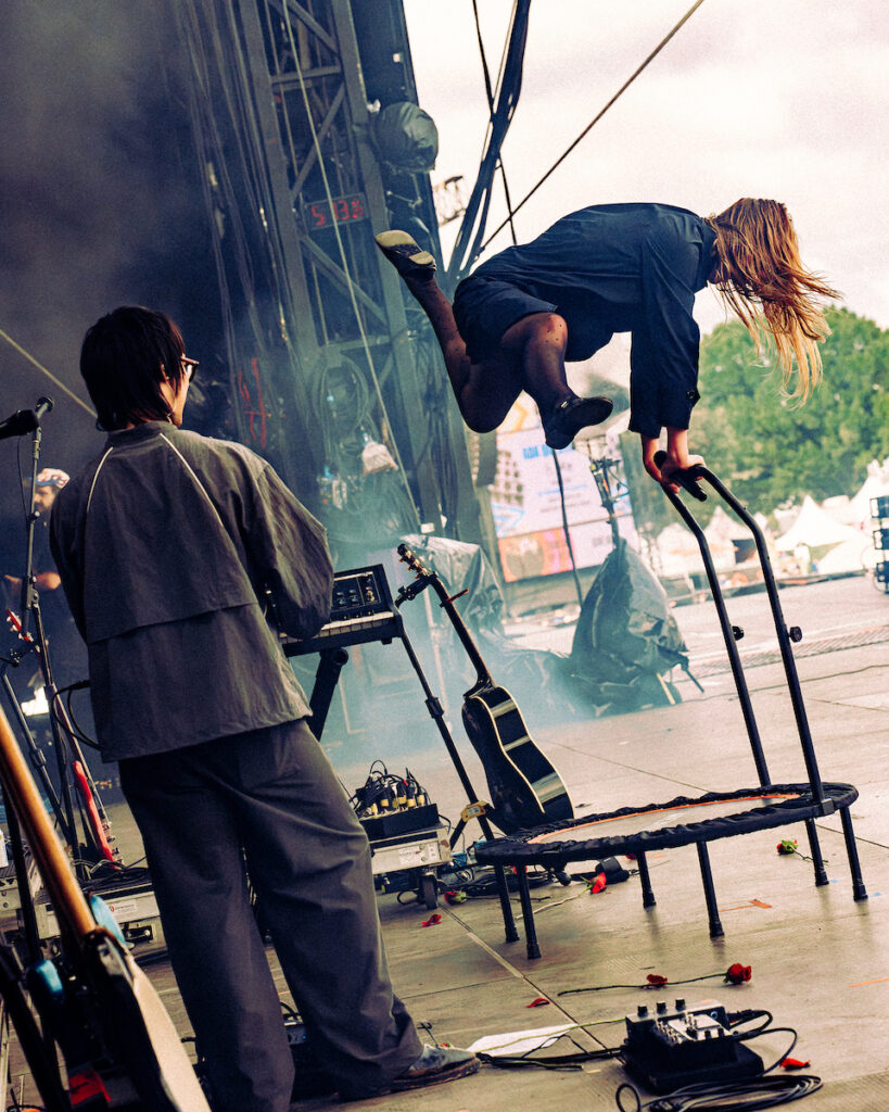 Audrey Hobert on a mini trampoline at ACL Fest