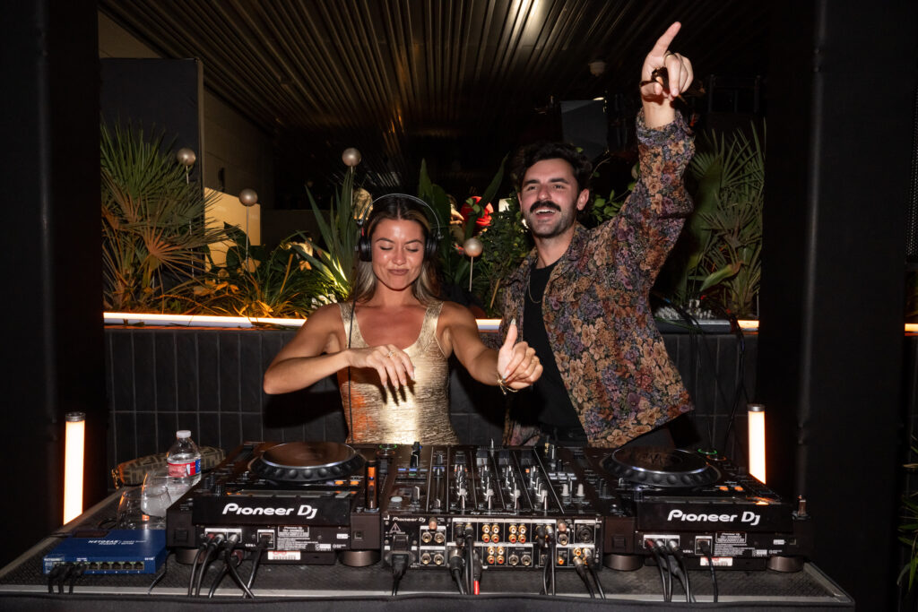 DJs spins during the Clarins Lights Up the Austin Skyline with a Celebration of Skin Longevity and The Launch of Double Serum Serum Eye During Grand Prix Weekend on October 24, 2026 in Austin, Texas. (Photo by Marcus Ingram/Getty Images for Clarins)