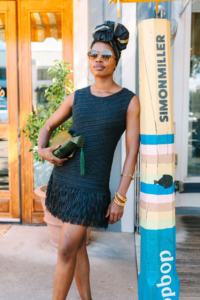 Paola Mathé wearing the SIMONMILLER Mira Crochet Mini Dress.